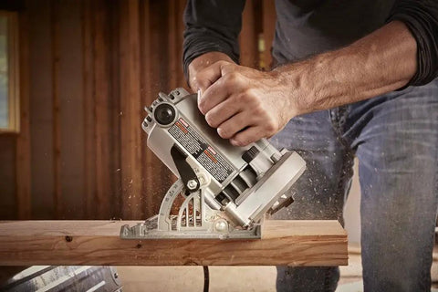Tough As Nails 15 Amp Seven Quarter Inch Sidewinder Circular Saw With Left Blade Design used on wood for precision cuts.