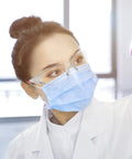 Tough As Nails Clear Safety Glasses Featuring Scratch Resistant Lenses And ANSI Z87 Certification for lab work with vibrant red frames.