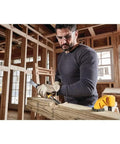 Pro Grade 3 Piece Wood Chisel Set With Tempered Carbon Steel Blades being used for carpentry on a wooden beam.