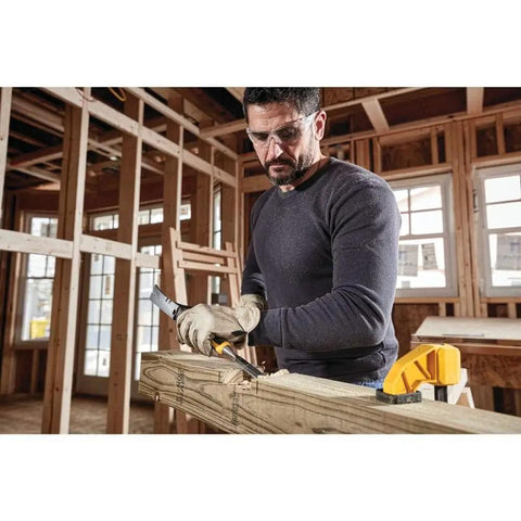 Pro Grade 3 Piece Wood Chisel Set With Tempered Carbon Steel Blades being used for carpentry on a wooden beam.