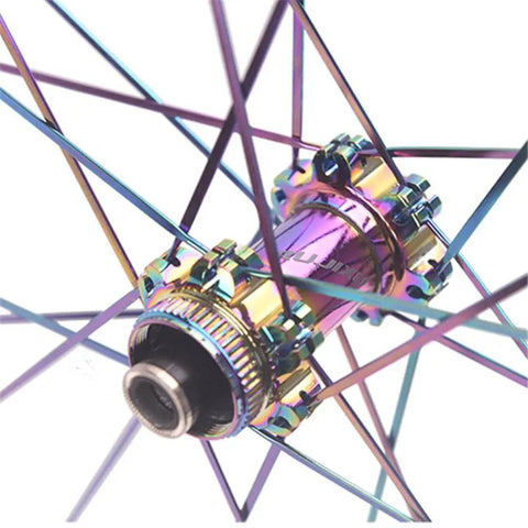 Close-up of colorful 24 hole hub on Beefy 50mm Carbon Fiber Road Wheelset With Center Lock Disc Brakes Quick Release 700C