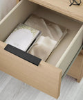 Matte Black Edge Finger Pulls 10 Pack, Concealed Drawer Handles on wooden cabinet drawer, showing modern design in use.