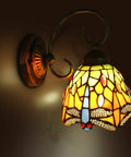Dragonfly Stained Glass Tiffany Style Wall Light with LED E26 Bulb, warm white ambiance, handmade stained glass sconce lighting.