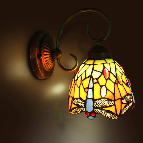 Dragonfly Stained Glass Tiffany Style Wall Light with LED E26 Bulb, warm white ambiance, handmade stained glass sconce lighting.