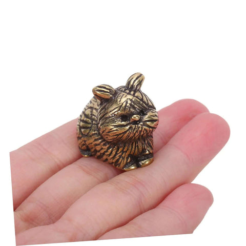 Person holding a cat shaped brass cabinet knob from Cat Shaped Brass Cabinet Knobs Set For Kitchen Bedroom And Bath, Dope Vintage Animal Drawer Handles.