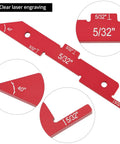 Close-up of a red anodized aluminum setup block with laser-engraved markings, part of 14-Piece Aluminum Setup Block And Height Gauge Kit