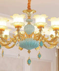 Next Level Modern Chandelier With Bold Adjustable Design And Sparkling Crystal Glass Accents Bright 15 Light Led Ceiling Pendant For Bedroom Dining Room Or Grand Foyer Gold Blue Zinc Finish Vibe Upgrade with floral light shades.