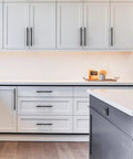 Modern kitchen with Matte Black Solid Cabinet Pulls 5 Inch 128mm Hole Centers Pack Of 10 Kitchen Handles Hardware ZH0070 on cabinets.