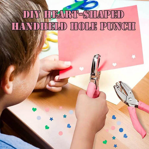 Child using Heart Shaped Paper Punch Handheld Perforator for DIY Crafts on pink paper, creating heart-shaped confetti with soft grip handle.