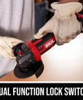Person holding PWR CORE 20 Brushless 20V 4 And A Half Inch Angle Grinder Kit with dual function lock switch