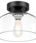 Solid Fit Clear Glass Semi Flush Mount Ceiling Light With Heavy Duty Metal Frame And Matte Black Finish Built To Last, close-up view.