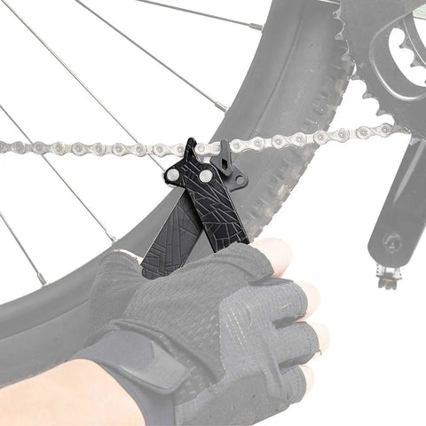 Cyclist using Power Lever X 5-In-1 Master Link Pliers And Tire Levers With Chain Hook Presta Core Tool on bike chain