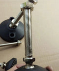 Close-up of adjustable threaded leveling feet with swivel base for cabinets, tables, and chairs, strong load support, rust resistant
