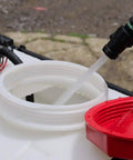 Filling the translucent tank of 15-Gallon 12 Volt Dripless EZ Mount ATV UTV Spot Sprayer With 2.2 GPM Diaphragm Pump