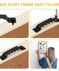 Sixty Piece Premium Sawtooth Picture Hangers With Matching Wall Screws And Utility Bag in use for easy frame hanging.