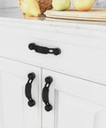 Installed 10 Pack 3 Inch Matte Black Cabinet Handles for Kitchen Cupboards and Drawers, durable metal construction cabinet pulls hardware.