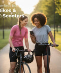Two women with bikes and e-scooters in a park setting, showcasing 4K Bike Camera With GPS Tracking And Integrated Cycling Computer Headlight.
