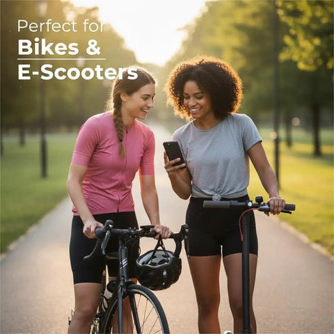 Two women with bikes and e-scooters in a park setting, showcasing 4K Bike Camera With GPS Tracking And Integrated Cycling Computer Headlight.