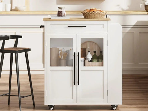 Farmhouse Mobile Kitchen Island Cart With Slick Rolling Lockable Casters And Front Glass Cabinet Plus Roomy Gear Hauler Drawer And Three Tier Spice Shelf For Weekend Cookoffs, white and wood design with glass cabinet.