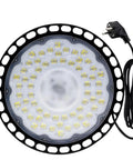 UFO LED Floodlight High Bay Light 200W Waterproof Industrial Lamp with plug, close-up of round lamp with LED array.