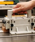 Heavy Duty Adjustable Three Way Force Push Block For Table Saws Jointers Stationary Power Tools Featuring Rugged Comfort Grip in use adjusting thickness.