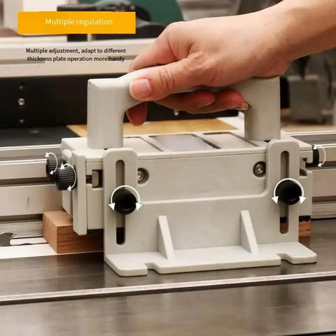 Heavy Duty Adjustable Three Way Force Push Block For Table Saws Jointers Stationary Power Tools Featuring Rugged Comfort Grip in use adjusting thickness.