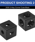Two black 2020 corner cube M6 connectors for V-Slot aluminum extrusion, product shooting shot