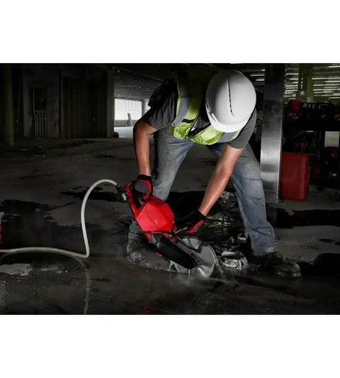 Worker using Badass 18V Cordless Power Cut Off Saw With Nine Inch Diamond And Abrasive Blades for cutting concrete.