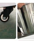 Massive Upright Freezer, Deep Freeze Cold Storage With Slick Casters And Tight Seal Lid For Home Basement Or Apartment close-up of caster wheel and stainless steel bucket.