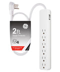Image of a white six-outlet surge protector with a 2 ft cord, featuring a flat plug and safety covers. Black packaging with product details.