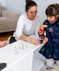 Young girl with adult assembling furniture using Mini Copper Hinges Set 75 Pieces With Screws 4 Hole Small Retro Hinges For Jewelry Boxes DIY.