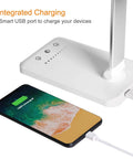 Eye Caring LED Desk Lamp With USB Charging Port, Touch Dimmable Office Light base showing integrated USB charging with phone connected.