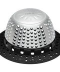 Ditch The Nasty Clogs With This Heavy Duty Shower Drain Hair Catcher Snags Fuzz And Debris Fast Fits Pop Up And Standard Tub Drains Easy To Rinse Off In Sleek Black, featuring a silver steel dome and black silicone base.