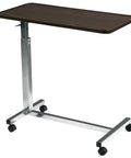 Heavy Duty Adjustable Overbed Table With Dead Simple Height Changes Non Tilt Wood Grain Top And Smooth Rolling Swivel Casters for bedside use.