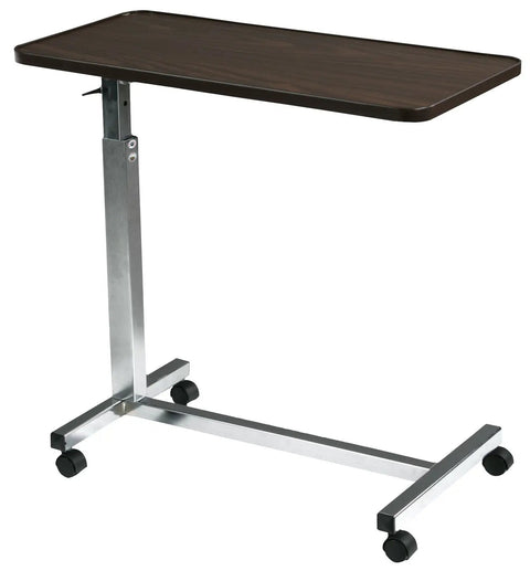Heavy Duty Adjustable Overbed Table With Dead Simple Height Changes Non Tilt Wood Grain Top And Smooth Rolling Swivel Casters for bedside use.