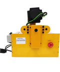 Pipe hole drilling machine, yellow body with black motor housing and red control knob