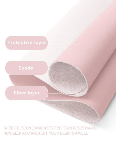 Cross-section of Pink Non Slip Leather Desk Pad With Waterproof Top For Laptop And Keyboard Large 23.6 By 13.7 Inches showing layers.