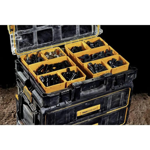 Open ToughSystem Tool Organizer 2.0 Full-Size with 10 Compartments, filled with tools, on dirt surface