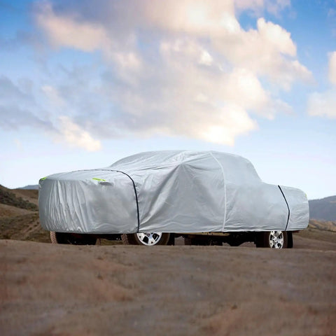 Truck covered by All Weather Truck Bed Cover Waterproof Six Layer Construction Fits Most Full Size Pickups Up To 250 Inches Long