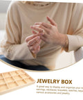 Person using a Solid Wooden Jewelry Dish With Thirty Tight Grid Dividers For Rings And Trinkets Great Sink Sidekick Or Vanity Organizer.