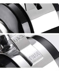 Close-up of Heavy Duty 50Mm Twin Wheel Casters With M6 Threaded Stem Smooth Rollin Black Nylon brake lock mechanism.