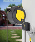 Hassle Free Wall Mounted Hose Reel With No Sweat Auto Rewind And Slick 180 Degree Swivel Bracket For Tangle Free Patio Garden Watering Holding Up To 32 Meters Of Heavy Duty Hose, showing hose extending from wall mount.