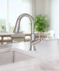 Close-up of hansgrohe Joleena Pull Down Kitchen Faucet, Transitional, Magnetic Hand Sprayer, 1-Handle, 1.75 GPM, Chrome, 04112000 on marble counter.