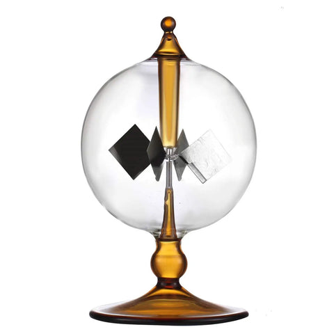 Orange Solar Powered Crookes Radiometer Glass Windmill Desk Ornament Sun Driven Spinning Vane Decor For Home Office Vacuum Glass Bulb Science Gift That Whirls Faster In Bright Light A Cool Modern Conversation Starter showing clear glass bulb and spinning vanes.