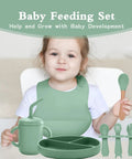 Child using Ultra Safe Silicone Baby Feeding Set 13 Piece With Suction Bowl And Plate Spoons And Forks Bib And Cup Baby Toothbrush.