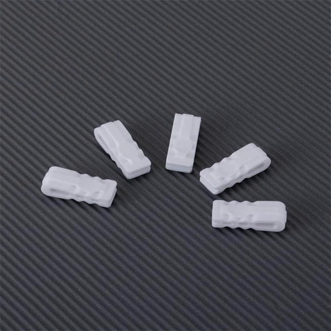 Top view of 10 Pack Vacuum Bag Clips With Sliding Grip For Tight Seals on dark surface