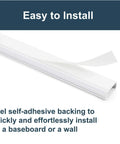 White Cord Cover for Mounted TV and Wall Cable Management, 12 Foot Cord Hider with pressure sensitive tape shown being installed.