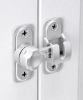 Close-up of Straight Up No Nonsense Premium Zinc Alloy Barn Door Lock featuring dual angle mounting on white door.