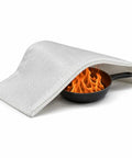 Fireproof Fiberglass Welding Cloth For Pipes And Equipment That Keeps Your Gear Safe During Welding covering a flaming pan