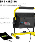 GoTo 60W LED Work Light Cordless Floodlight With 6000LM showing battery indicator and USB charging connected to a smartphone